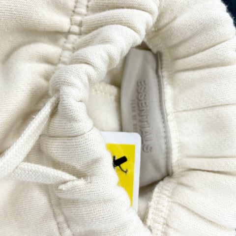 Fear of God Essentials Running Shorts 'Egg Shell' | XS