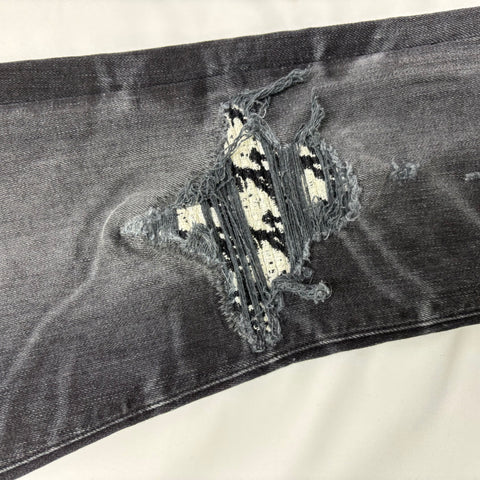 Amiri MX1 Jeans with White Patched Knee 'Black Faded' | US M