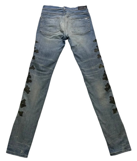 Amiri Camo Bones Patched Jeans 'Light Indigo' | US M (33")