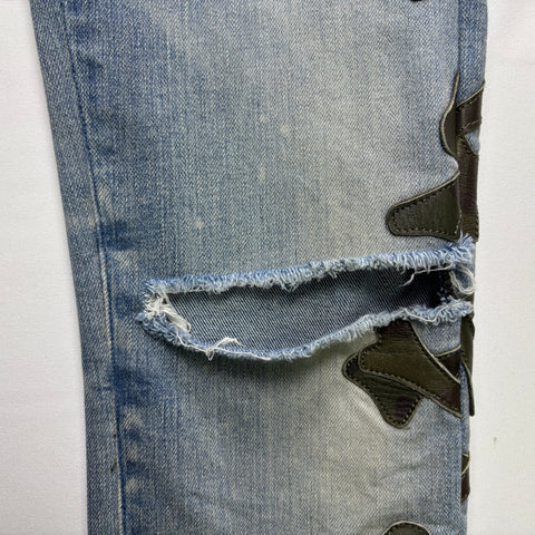Amiri Camo Bones Patched Jeans 'Light Indigo' | US M (33")